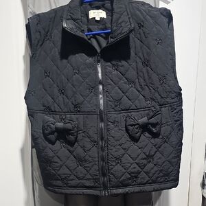 Womens Umgee Black Quilted Vest with Bow Accents